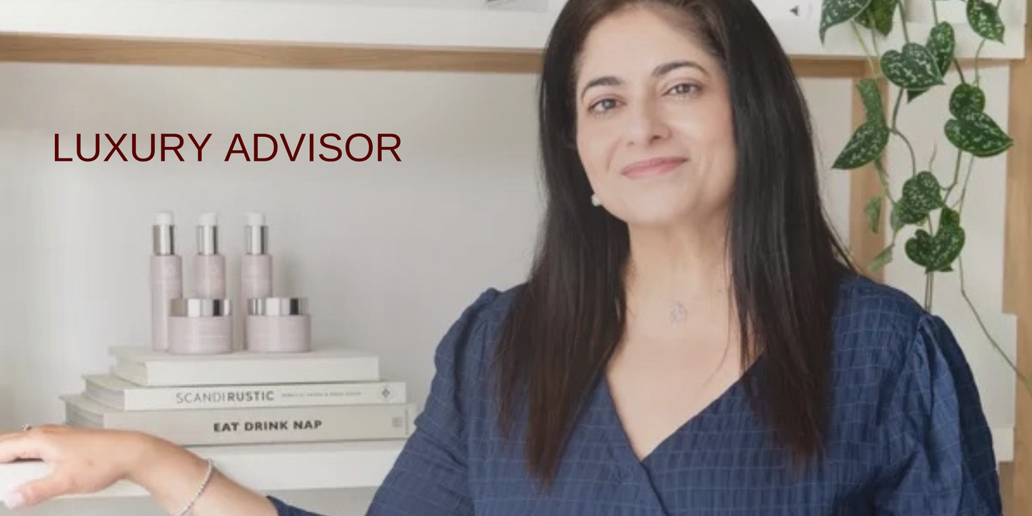 Anara's Founder Arati Nar standing with the range on a shelf in the background