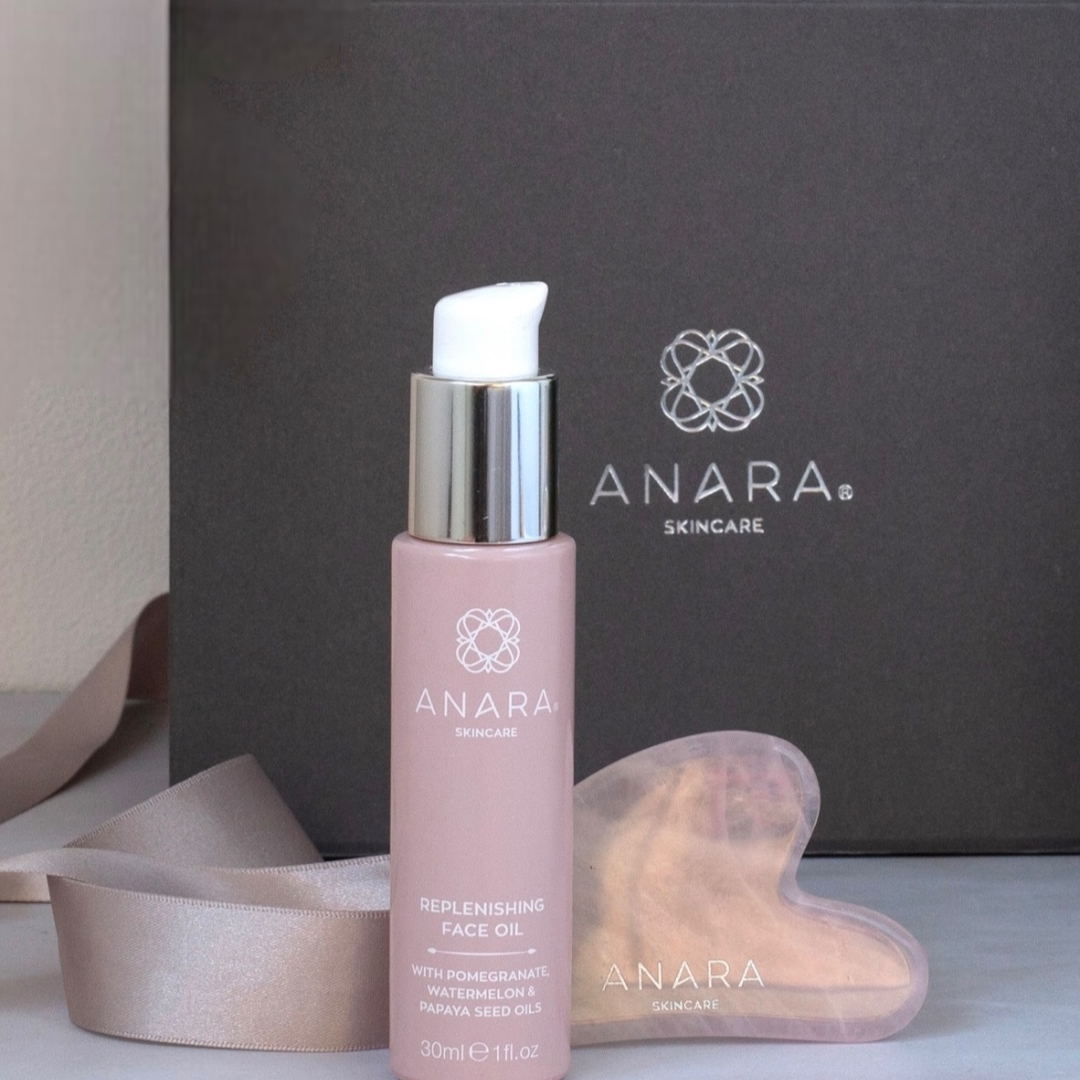 
                  
                    Replenishing Face Oil & Rose Quartz Gua Sha with Anara magnetic gift box and a silver ribbon
                  
                