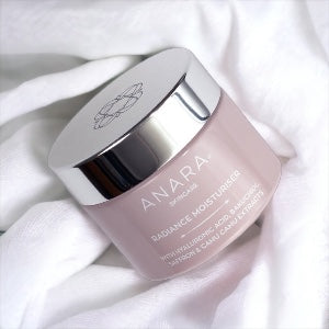 Anara Skincare Radiance Moisturiser laying on a soft white surface.