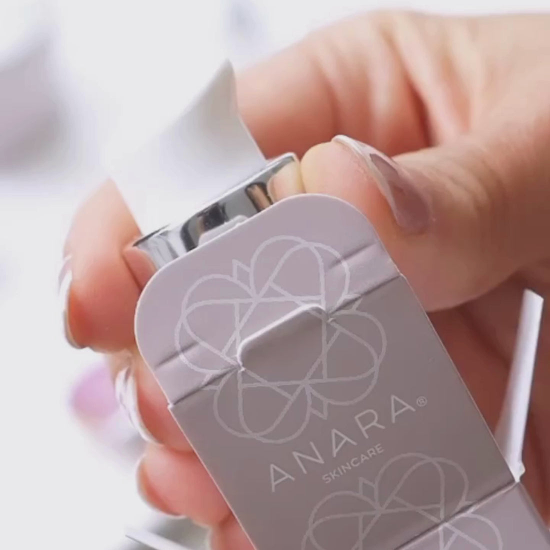 Anara Skincare Replenishing Face Oil being used with Rose Quartz Gua Sha for a facial massage